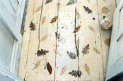 floor in the olson house with painted leafs